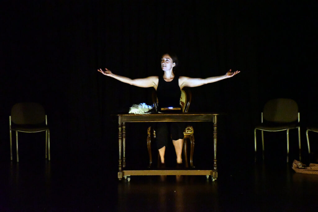 woman with arms outstretched