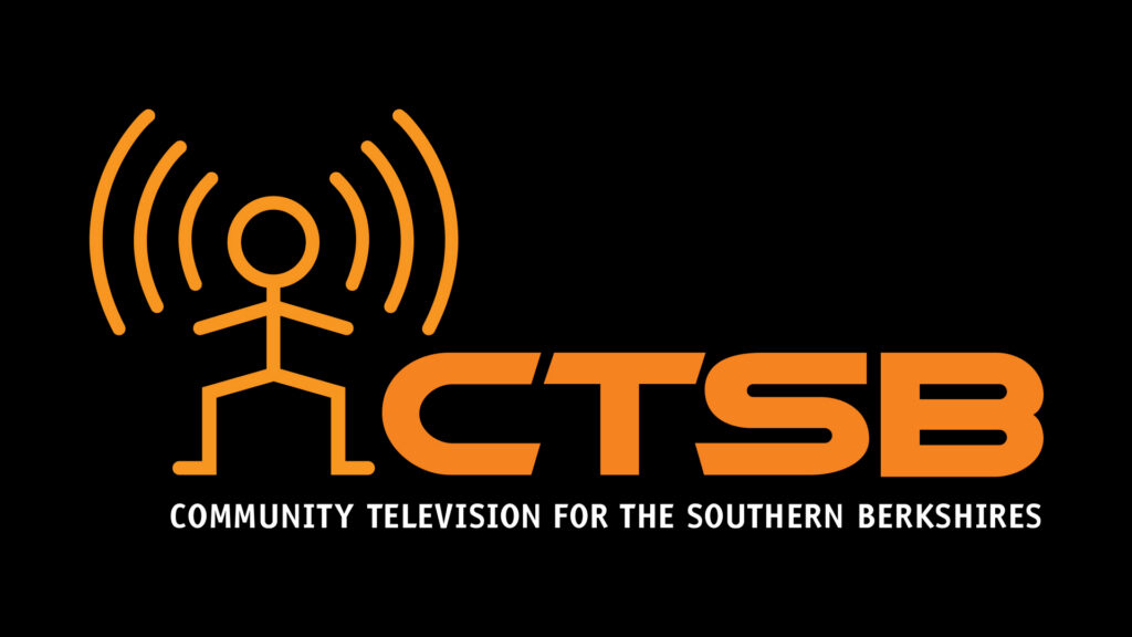 an orange logo on a black background